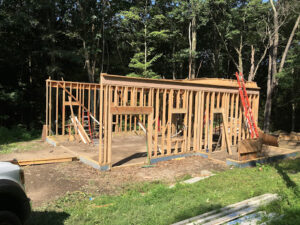 Pittsburgh Botanical Gardens barn deconstruction project in progress, with only framing still standing.
