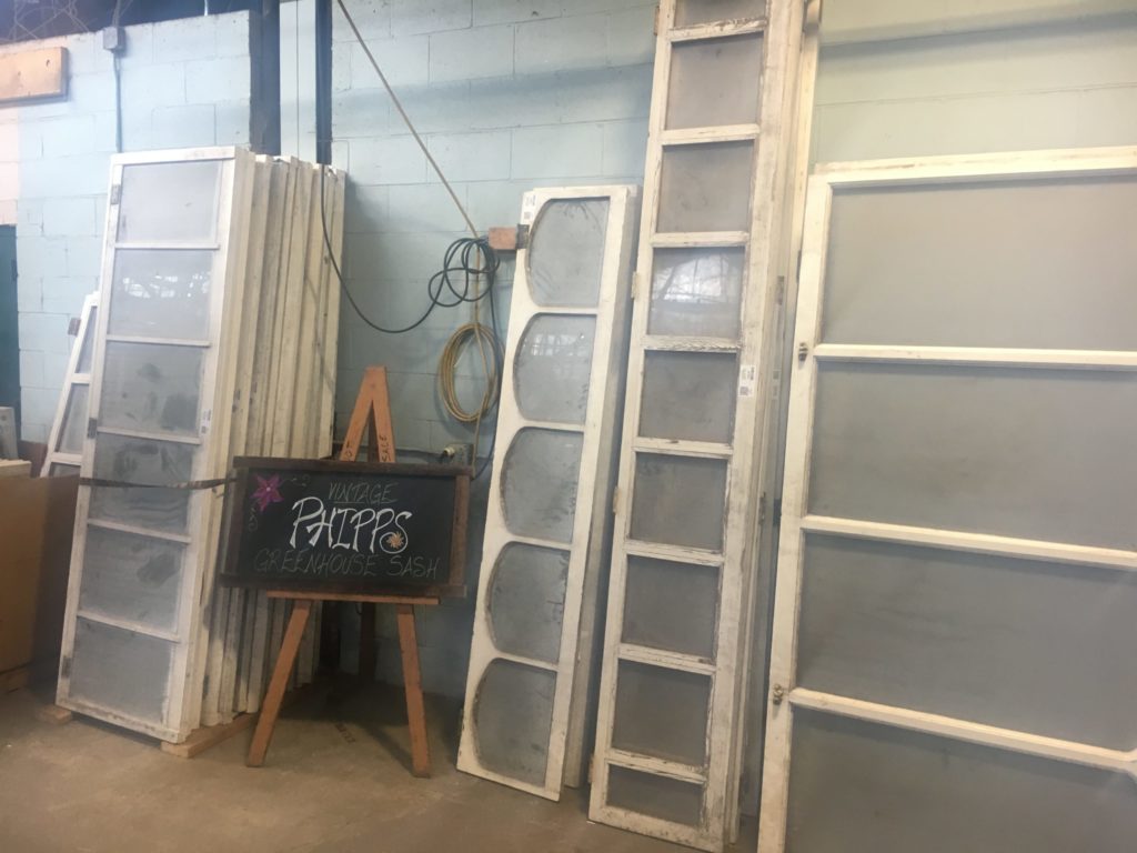 Salvaged greenhouse windows from Phipps Conservatory on display at CJ.