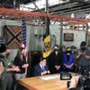 Mayor Peduto finishes signing the deconstruction Executive Order, seated at a table that was constructed here at CJ with a slab of salvaged bowling lane salvaged by our deconstruction crew.