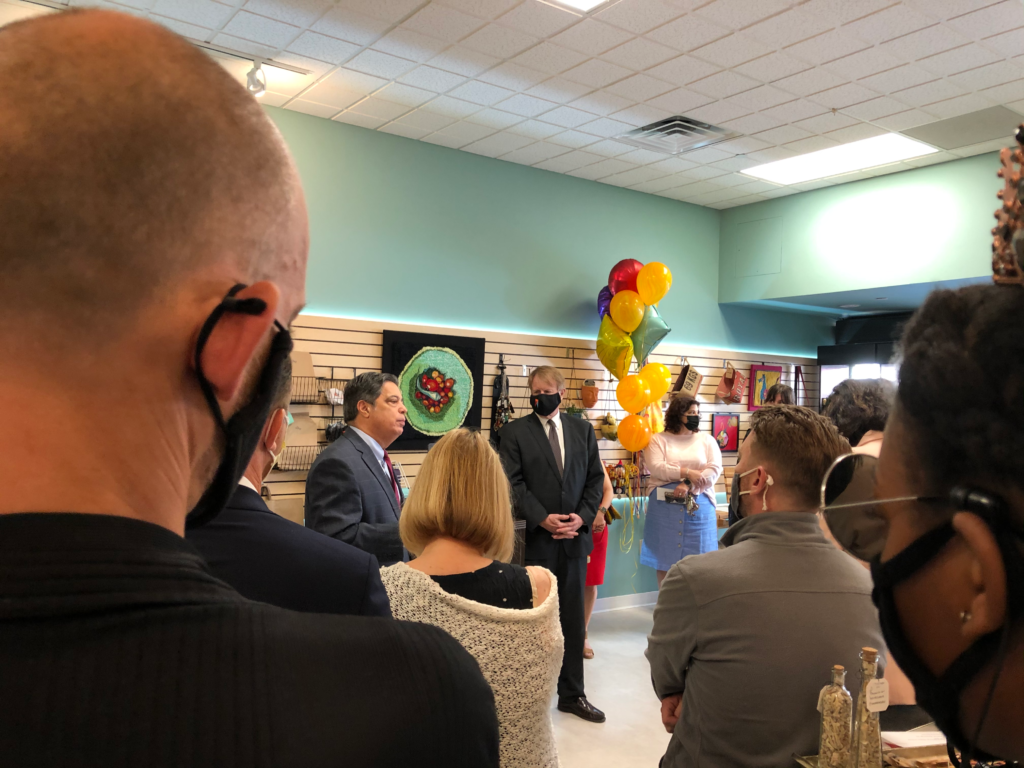 A crowd watches the speakers at the grand opening of Argyle Studio in the Pittsburgh neighborhood of Oakland.