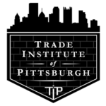Trade Institute of Pittsburgh black shield with city skyline logo