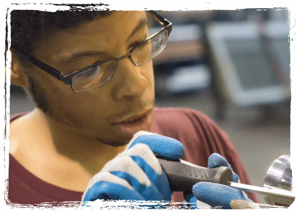 Goodwill job trainee removes door hardware