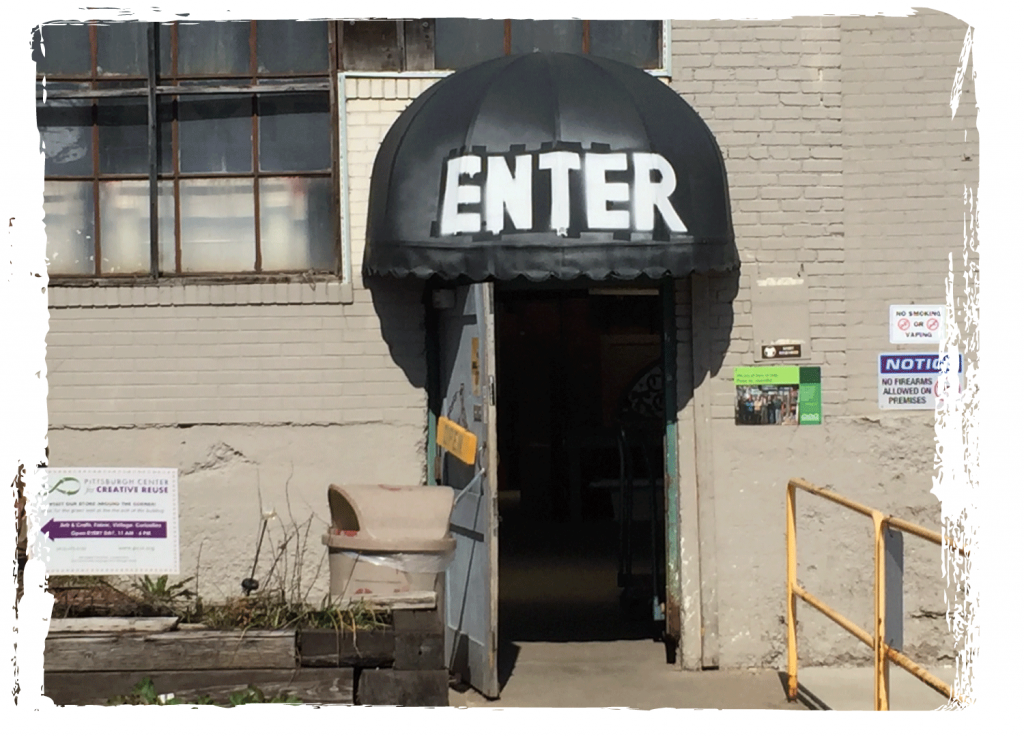 StoreEntranceBlackAwningRoughFrameImage