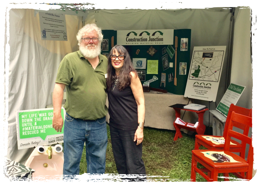 CJ outreach coordinator with Gerry Florida at the Studio Blue revamped furniture display at the Three Rivers Arts Festival.