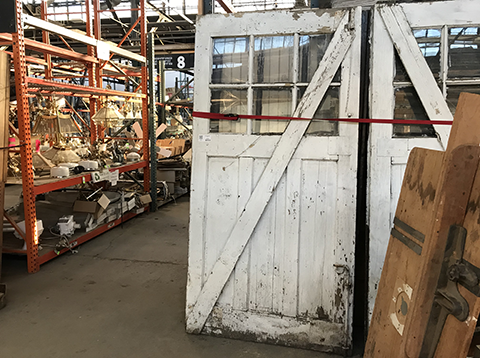 Reclaimed vintage doors stored at Construction Junction's Pittsburgh warehouse